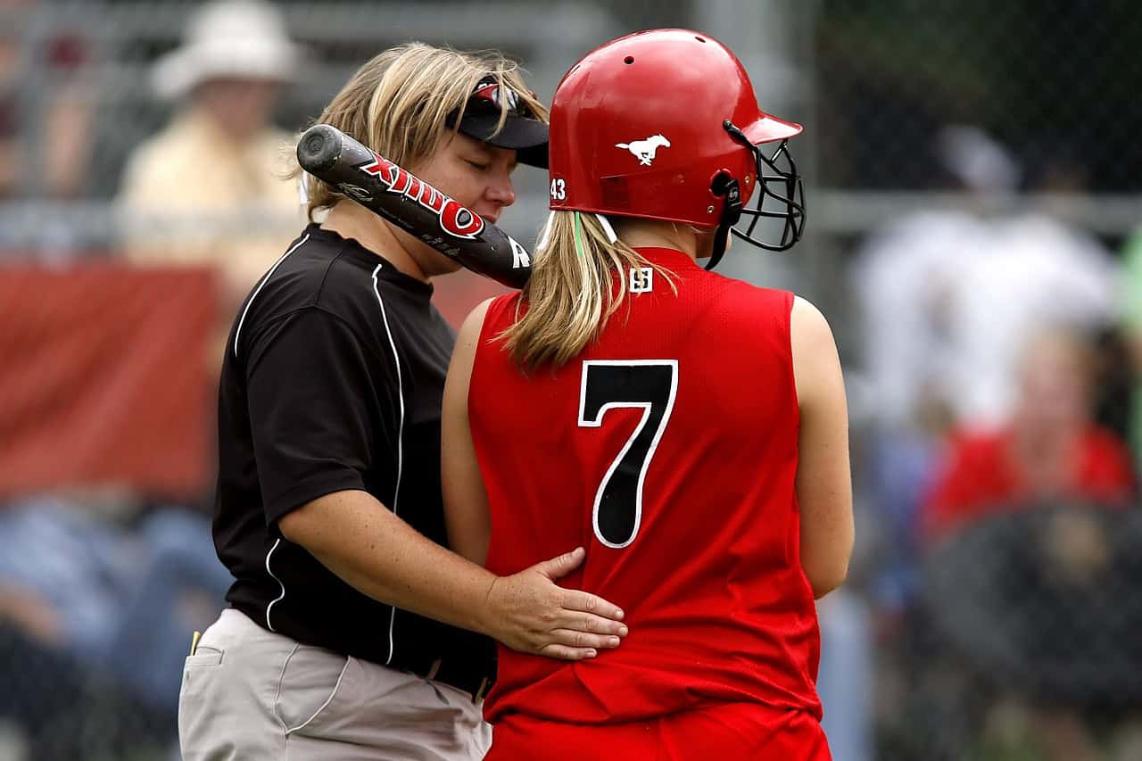 softball coach and athlete